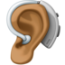 Facebook上的带助听器的耳朵：中等深色肤色emoji表情